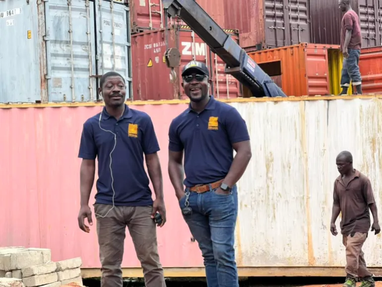 Eric Kwaku Gyimah with a member of staff at one of his construction sites near Accra, Ghana